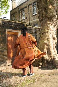 Rust silk robe with belt in 'Ember’ hand-painted design