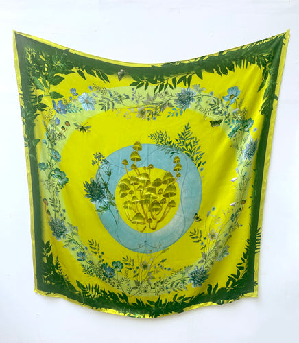 Vibrant yellow and pale blue ‘Luciferin’ floral silk scarf