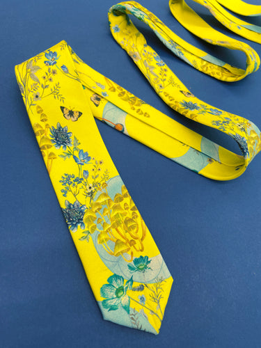 Vibrant yellow and pale blue ‘Luciferin’ floral silk tie